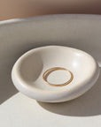 14k gold fill Minimal ring on a white plate