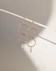 Ava Pearl Drop Earrings with minimalist gold ear wires and dangling freshwater pearls.