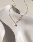 Elegant Ava Pearl Necklace crafted in 14K gold fill, showcasing timeless simplicity with a glowing freshwater pearl.