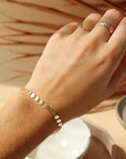 Model wearing 14k gold fill Starlight Bracelet - Token Jewelry
