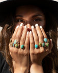 Model wearing 14k gold fill Turquoise Nomad Ring.