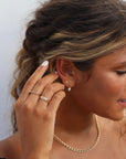 Model wearing 14k gold fill ripple ring