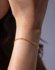 Model wearing 14k gold fill Capri Bracelet