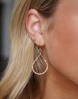 Model wearing 14k gold fill Essential Hoops