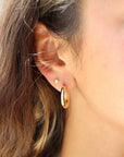 Model wearing 14k gold fill Everyday Hoops
