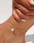 Model wearing 14k gold fill anklet
