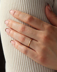smooth circular ring in 14k gold or sterling silver, handmade by Token Jewelry in Eau Claire, Wisconsin