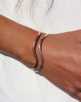 Model wearing Sterling Silver and Gold Fill Swell Cuff