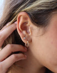 Model wearing 14k gold fill Moonstone studs