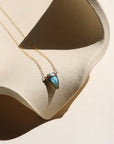 Spear-shaped labradorite pendant on gold chain, handmade anniversary jewelry