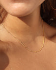 model wearing 14k gold fill chain necklace