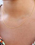 Model wearing a 14k gold fill dainty chain