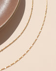 14k gold fill lip chain sparkling in natural sunlight