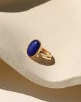 Twilight Lapis Ring resting on a ceramic dish.
