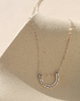 sterling silver hammered pendant on a delicate sterling silver chain necklace
