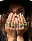 Model wearing 14k gold fill Turquoise Nomad Ring. 