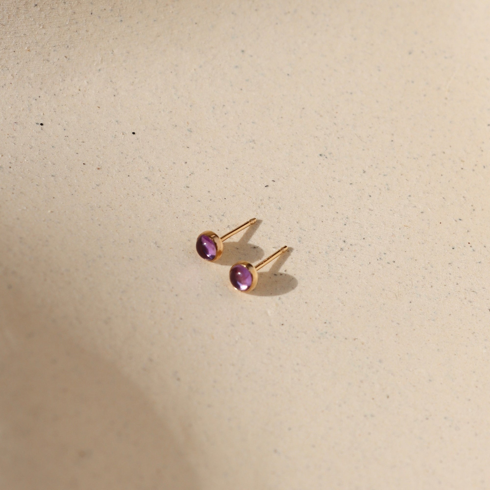 14k gold fill 4mm bezel ear stud with amethyst stone