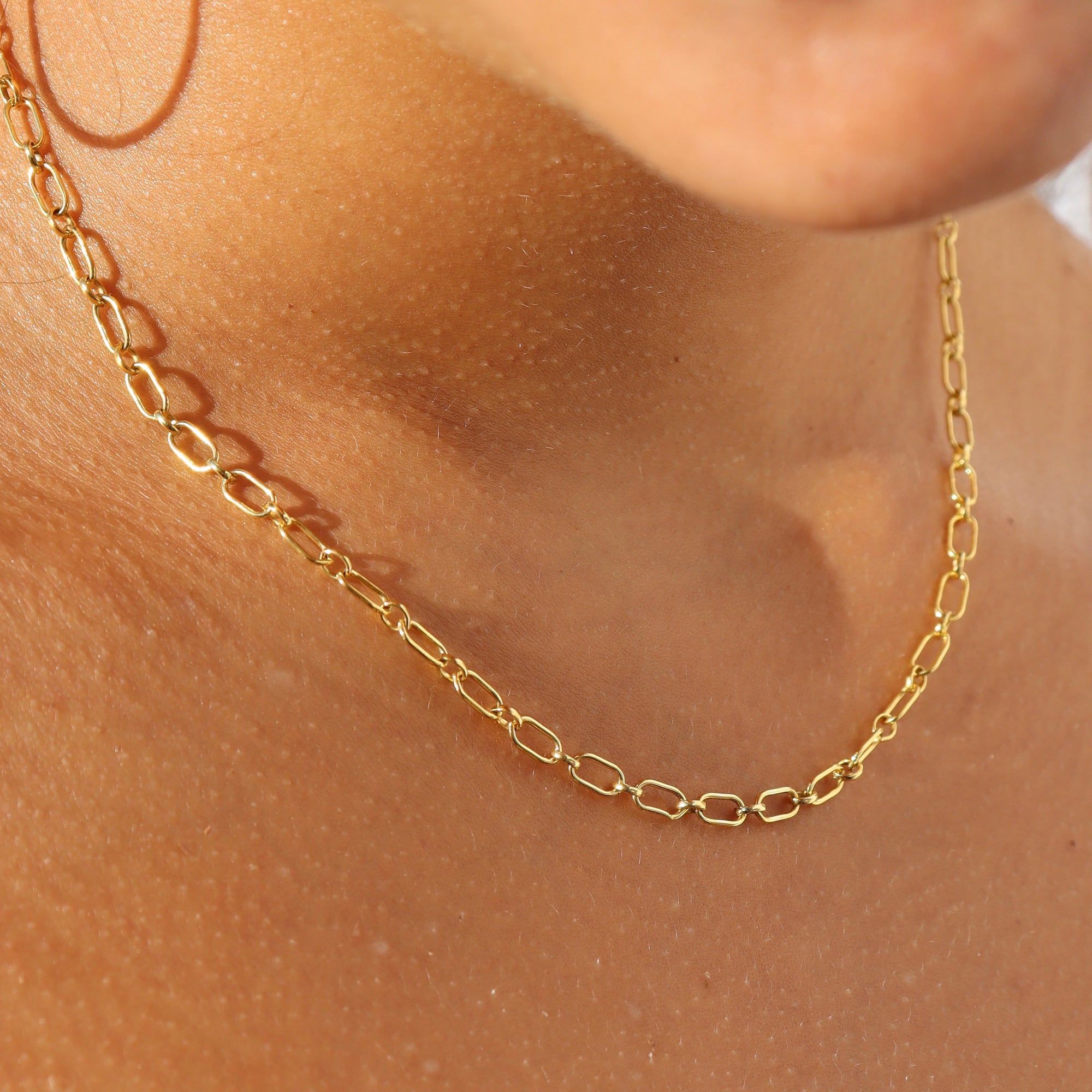 14k gold fill chain necklace on a model