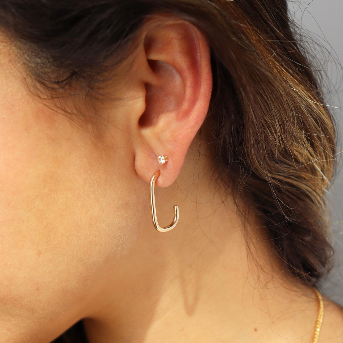 Chloe Hoops 14k gold fill on model