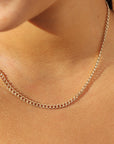 model wearing 14k gold fill curb chain 
