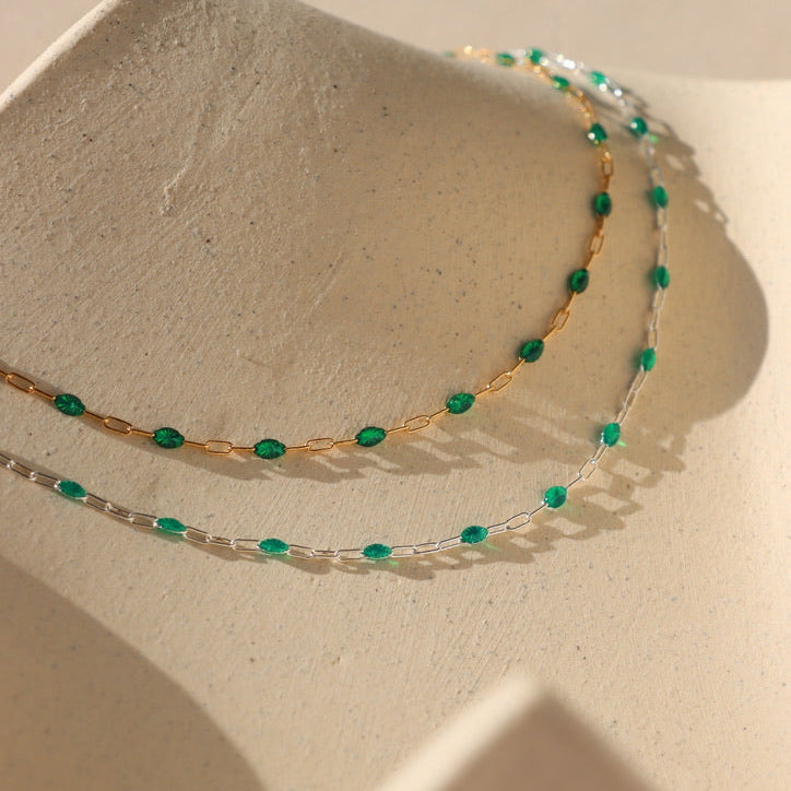 14k gold fill chain with emerald gemstones paired with sterling silver chain with emerald gemstones