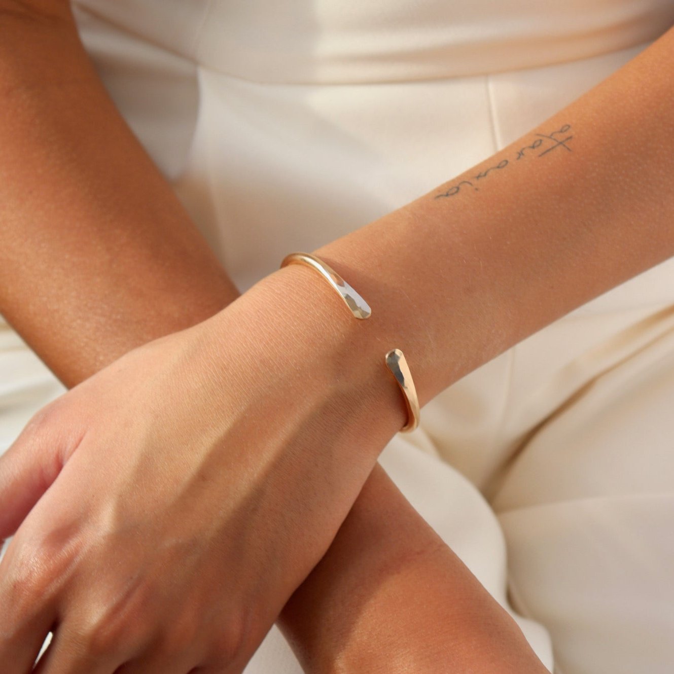 model wearing 14k gold fill hammered cuff