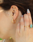 Model Wearing 14k gold fill Turquoise nomad ring.