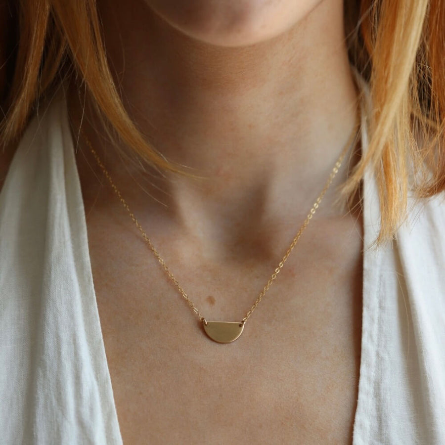 Sunrise Necklace - Token Jewelry - hand cut 14k gold fill or sterling silver sheet metal - half circle sunrise horizon shape - hanging from chain - locally handmade in our Eau Claire, WI studio - Token Jewelry