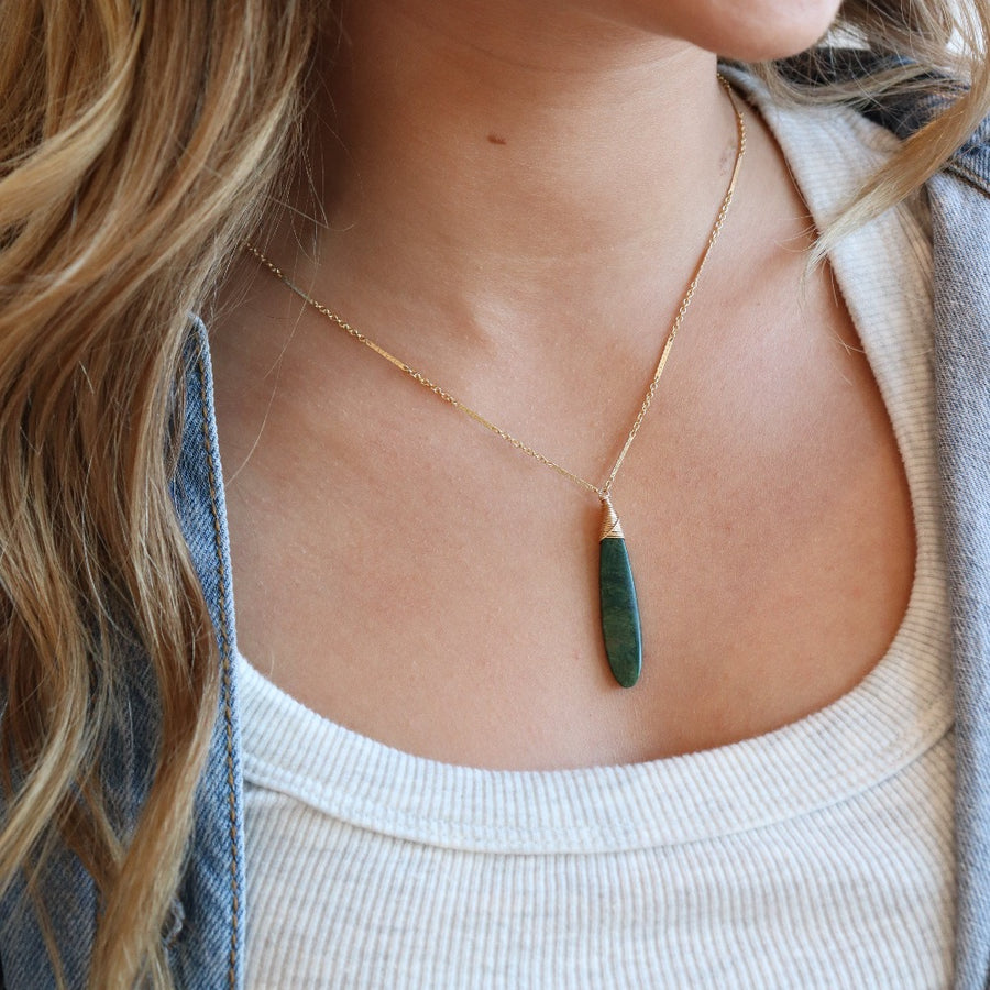 Token Jewelry Sailor chain necklace with a long green malachite stone, photographed on a blonde model