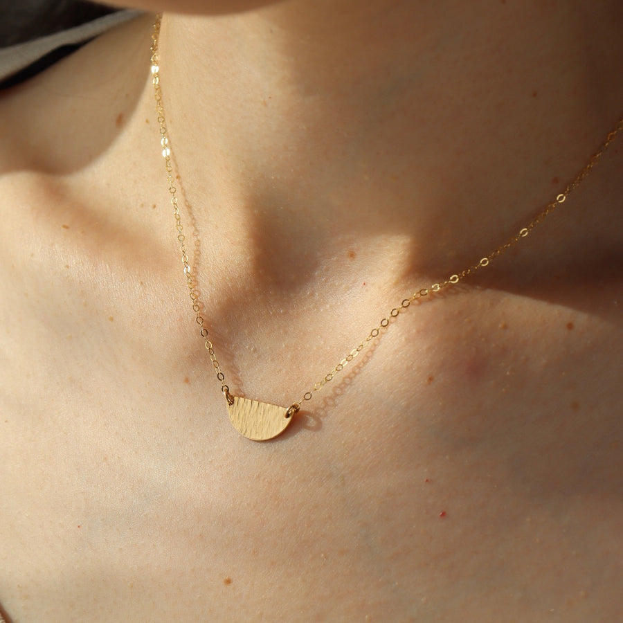 textured half-moon style necklace handmade by Token Jewelry in Eau Claire, Wisconsin