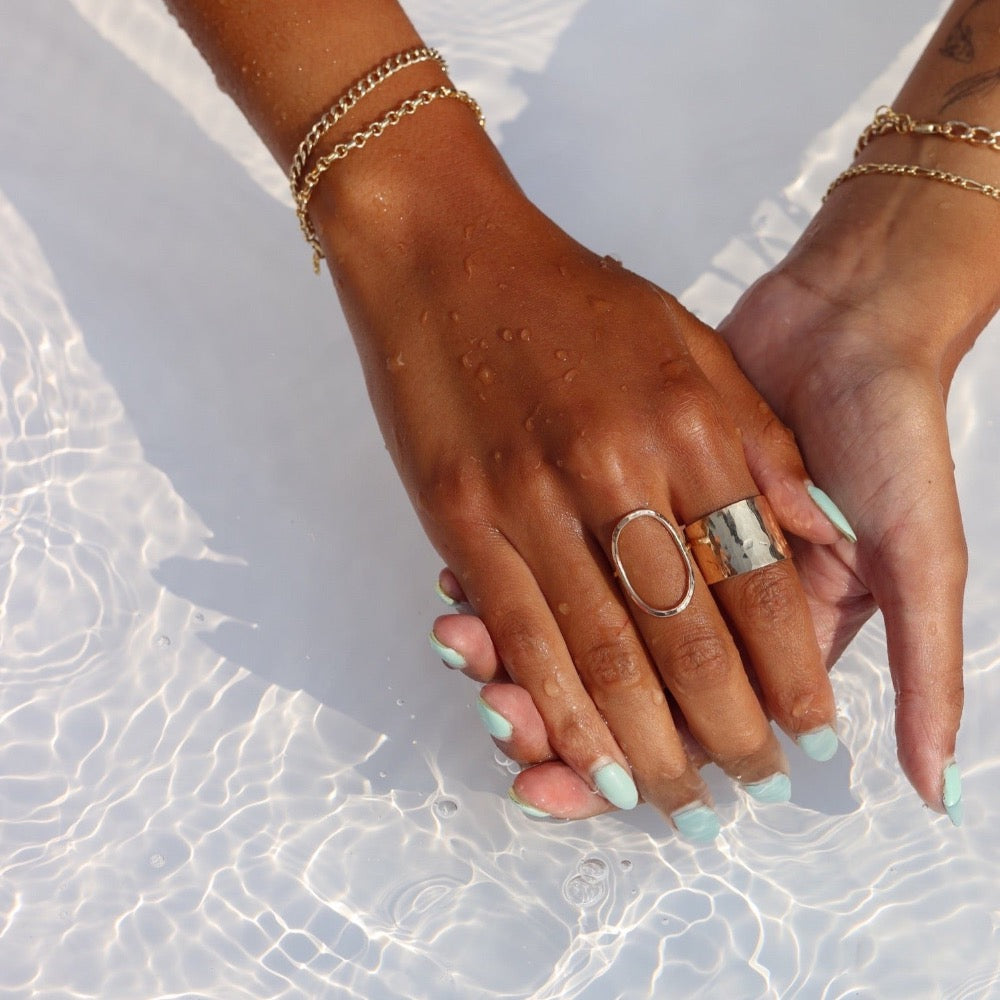 Model wearing 14k gold fill Olivia ring in the water 