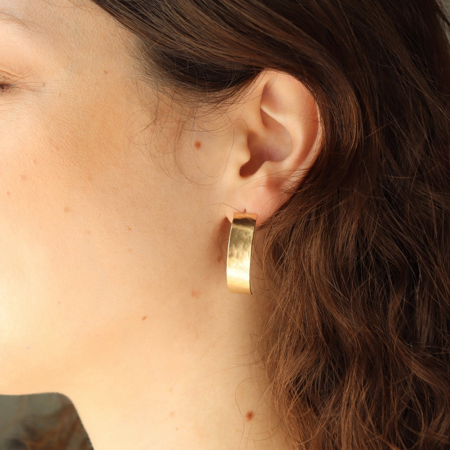 curved hammered gold earrings handmade by Token Jewelry in Eau Claire, Wisconsin
