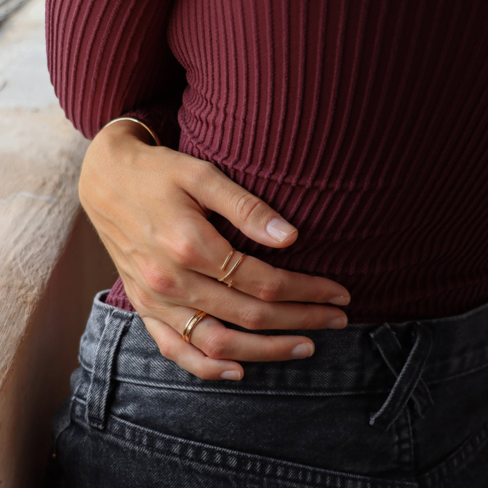 Lumen Ring handcrafted in 14k gold fill with a light-catching hammered texture.