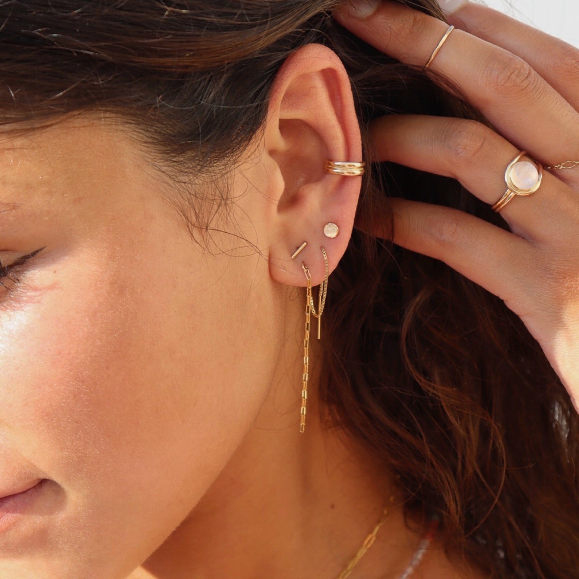 model wearing 14k gold fill chain threader earrings 