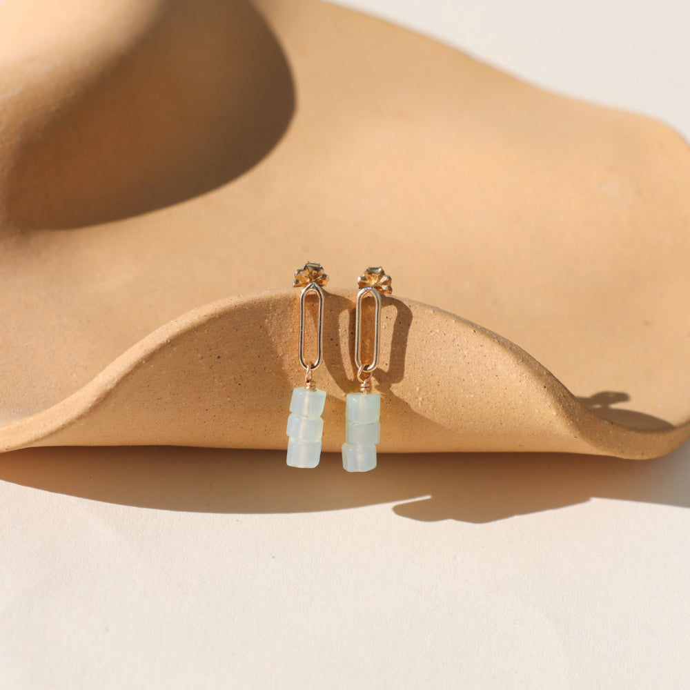 Selene Drops featuring pale green-blue chalcedony beads suspended from a slender oval in gold fill