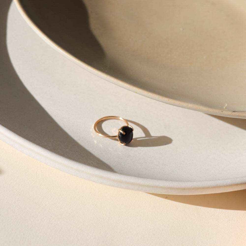 Stella Ring featuring a prong-set Black Agate in a 14k gold fill setting, inspired by the night sky