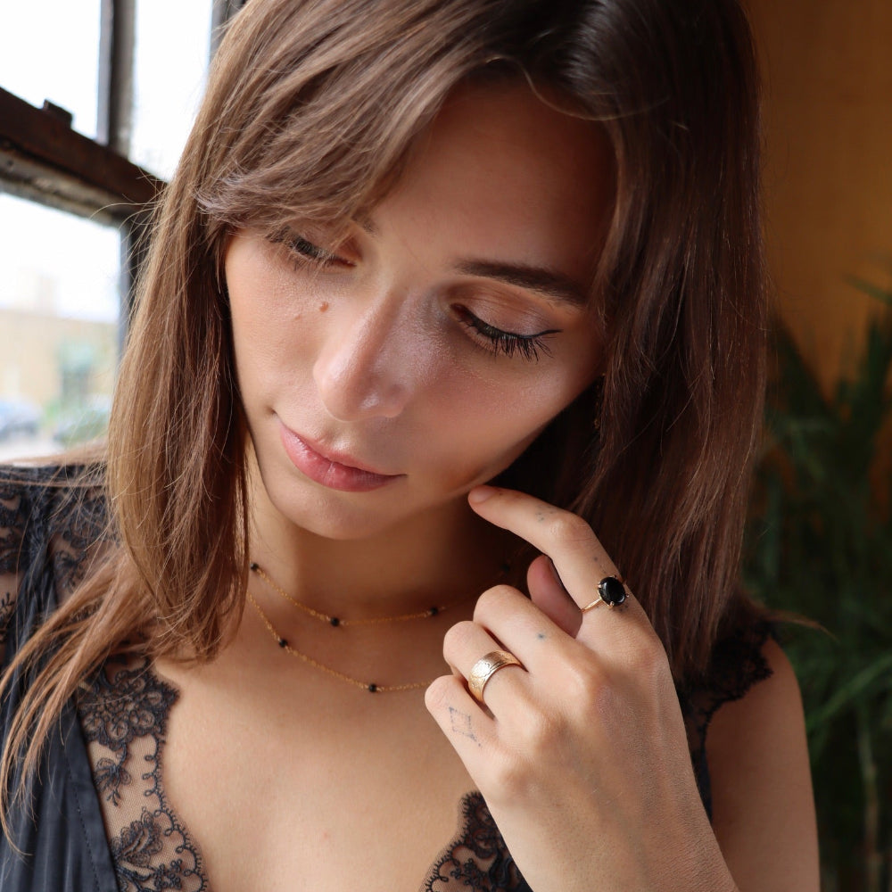 Stella Ring featuring a prong-set Black Agate in a 14k gold fill setting, inspired by the night sky