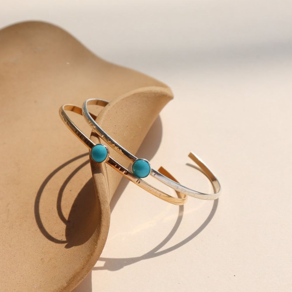Turquoise Skyline Cuff featuring a 6mm Sleeping Beauty turquoise cabochon on a hand-notched gold filled band.