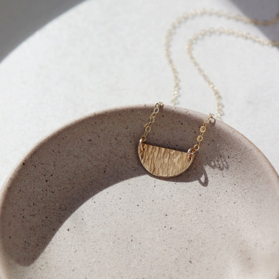 textured half-moon style necklace handmade by Token Jewelry in Eau Claire, Wisconsin
