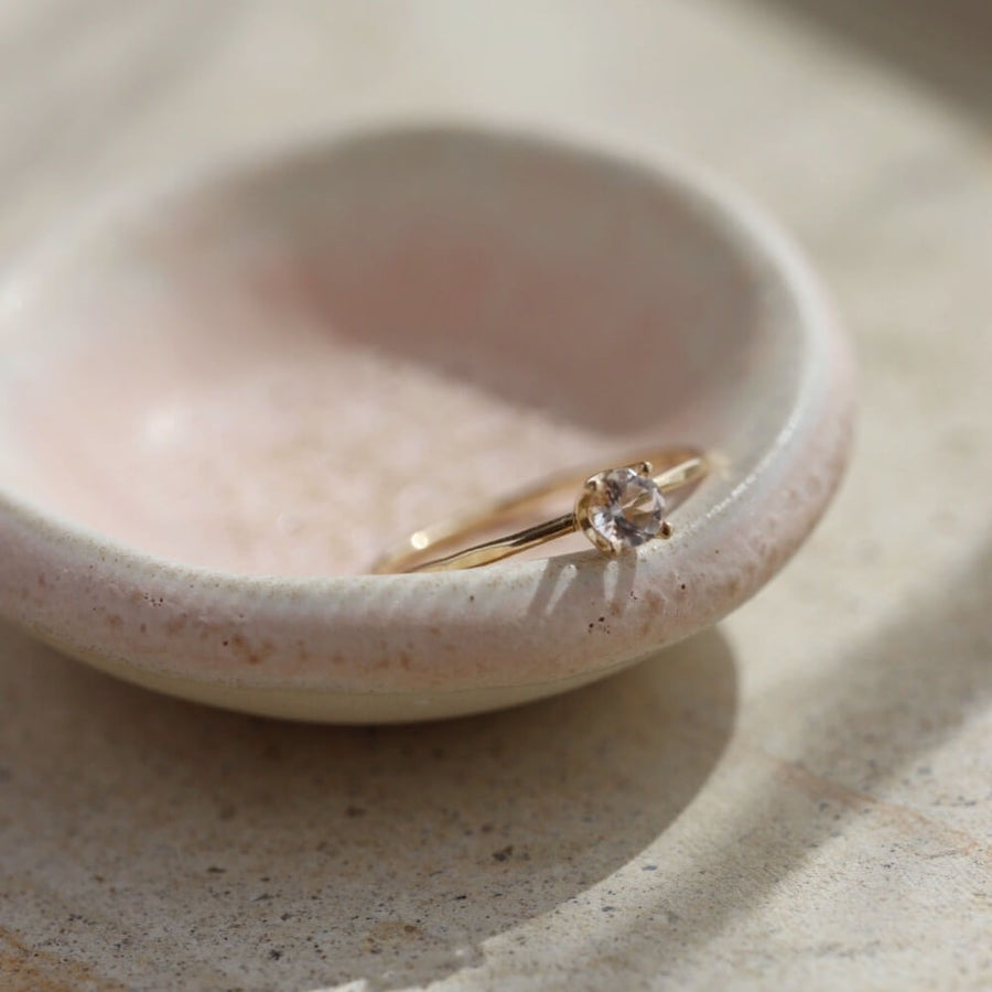 A pink variety of the mineral Beryl, this solid gold ring is adorned with a soft blush Morganite. A forever timeless,14k gold ring that you'll cherish for years to come. Each purchase comes with an elegant, vegan leather box for storing + caring for your jewelry.